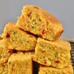 Jalapeño cornbread squares on top of each other - 13