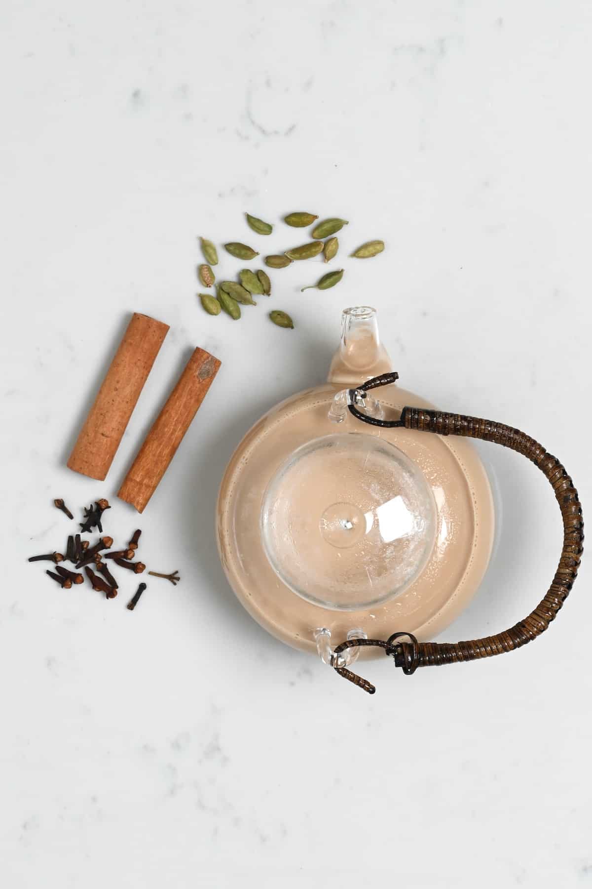 A tea pot with masala chai
