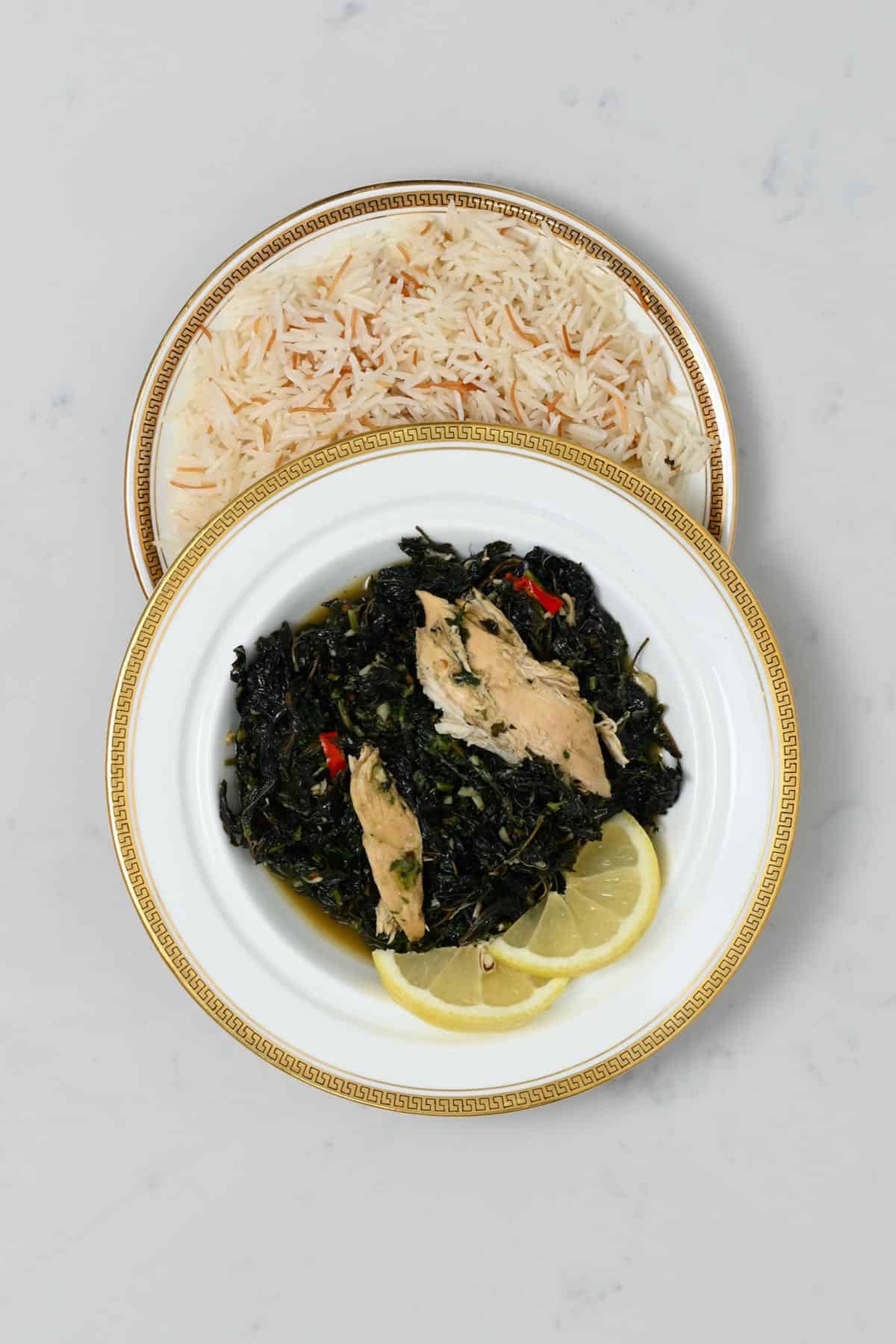 A serving of molokhia with chicken and rice