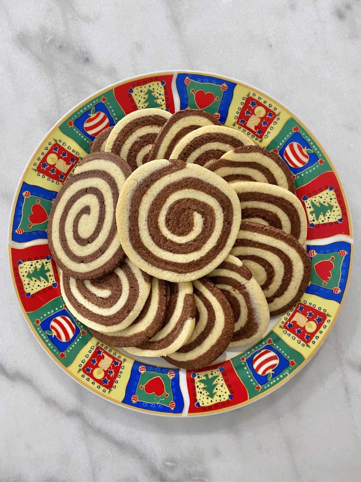 Pinwheel cookies on a Christmas plate