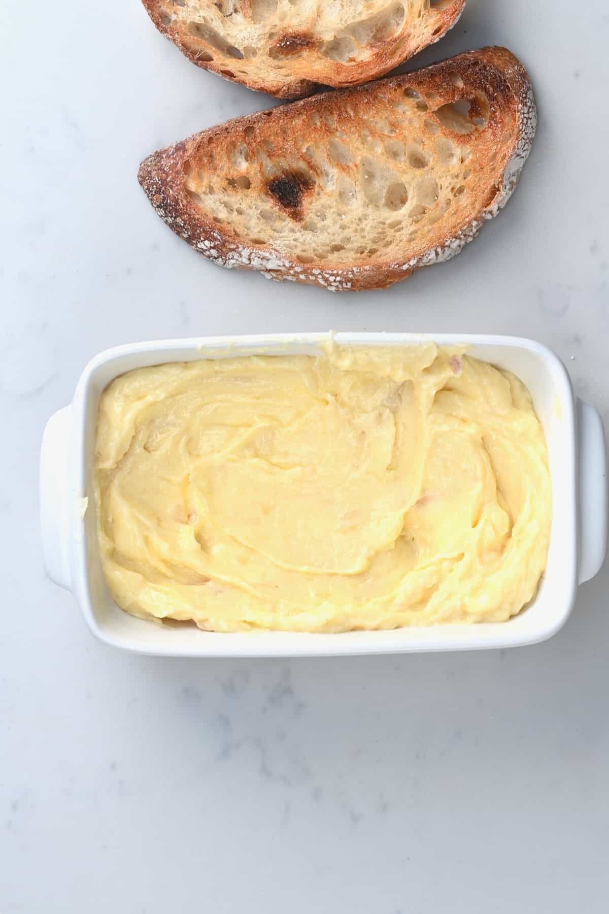 Roasted garlic butter and two toasts