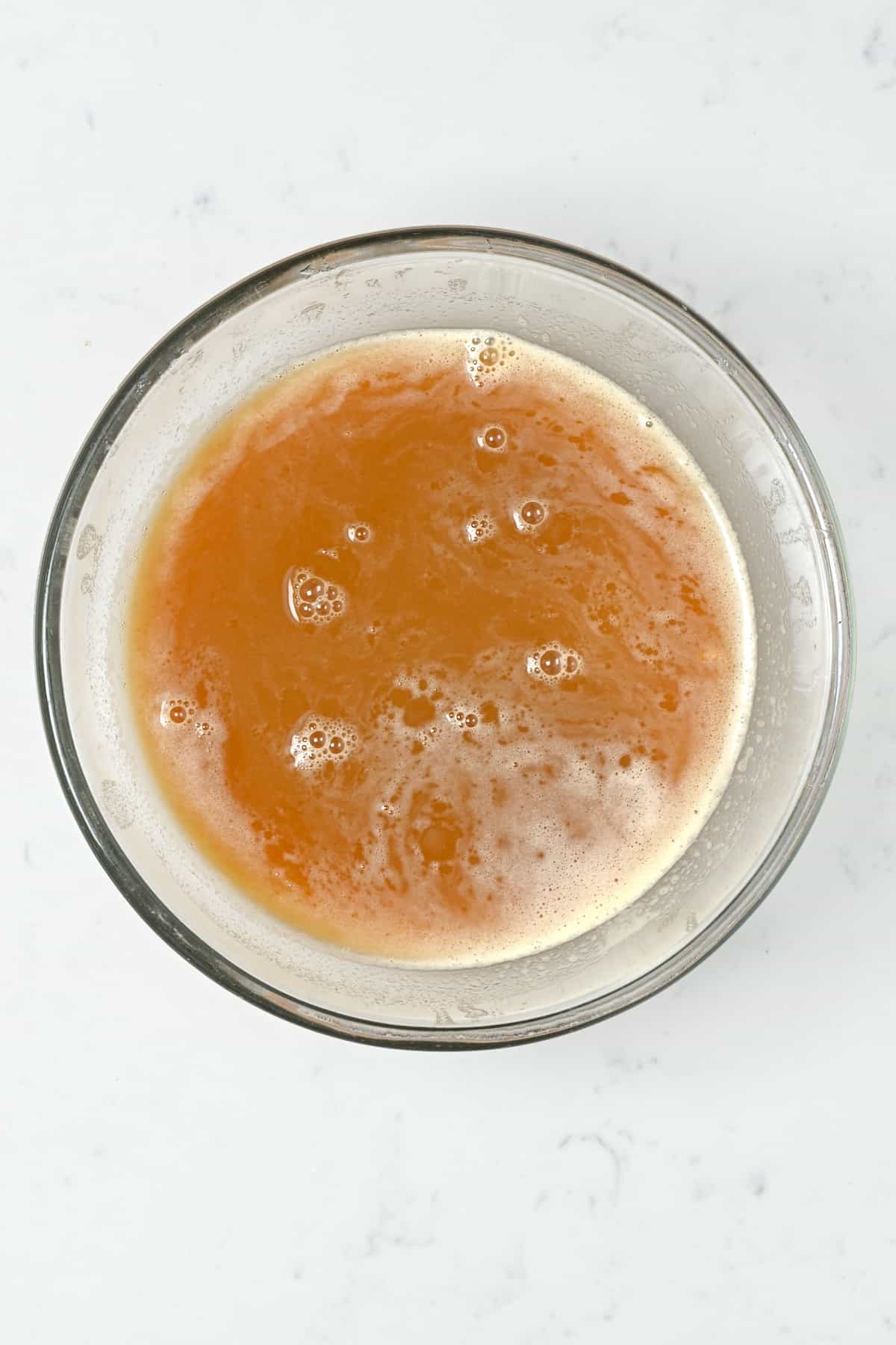A bowl with apple cider juice