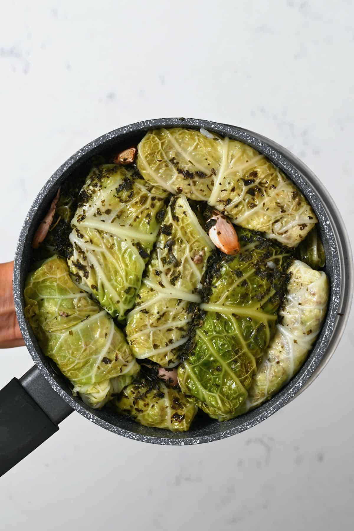 A saucepan with stuffed cabbage rolls