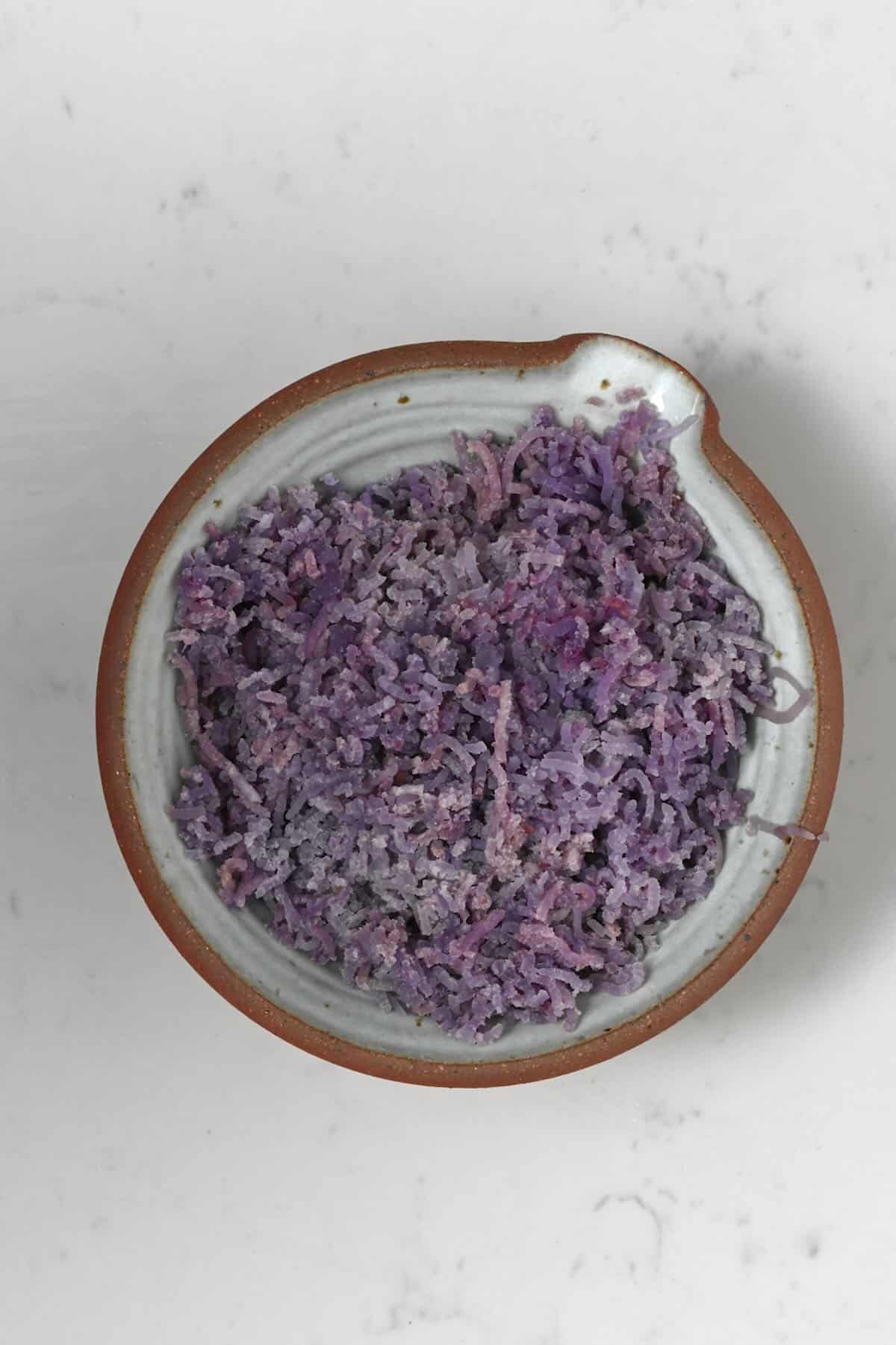 Mashed purple potatoes in a bowl