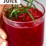 A glass with homemade cranberry juice