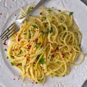 A serving of lemon pasta topped with chili flakes
