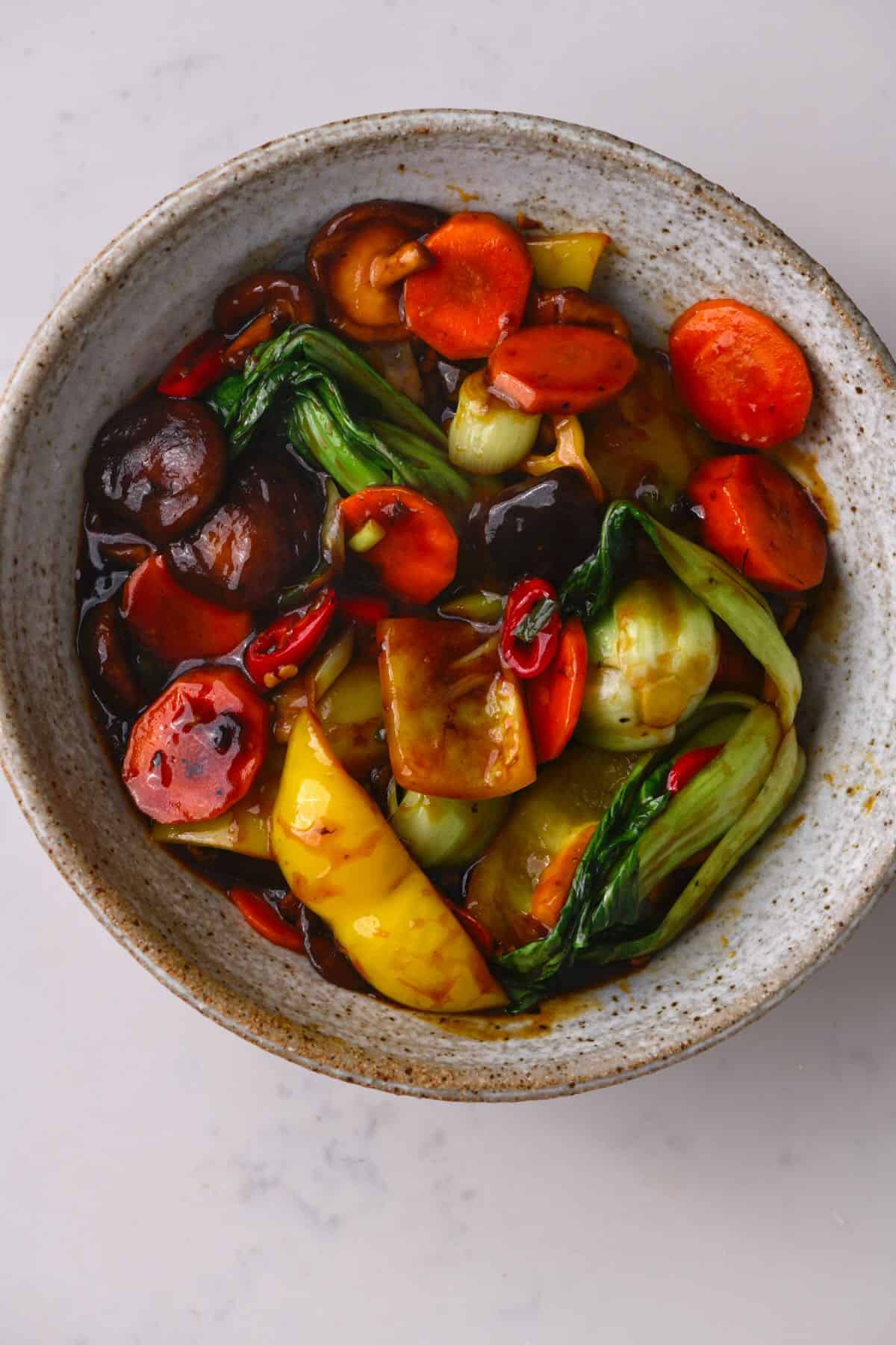 A bowl with vegetable stir fry