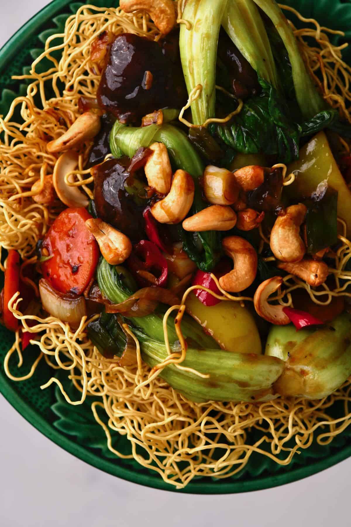 Stir fried vegetables and cashews over noodles