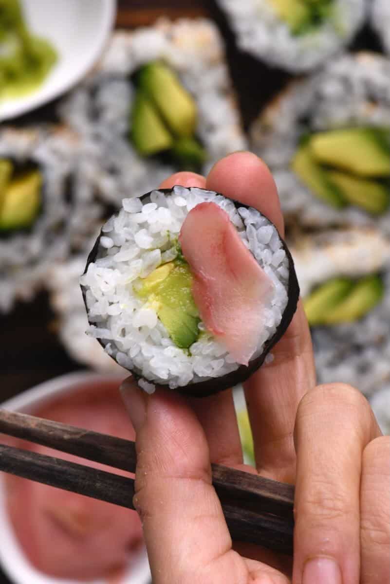 A piece of avocado sushi roll