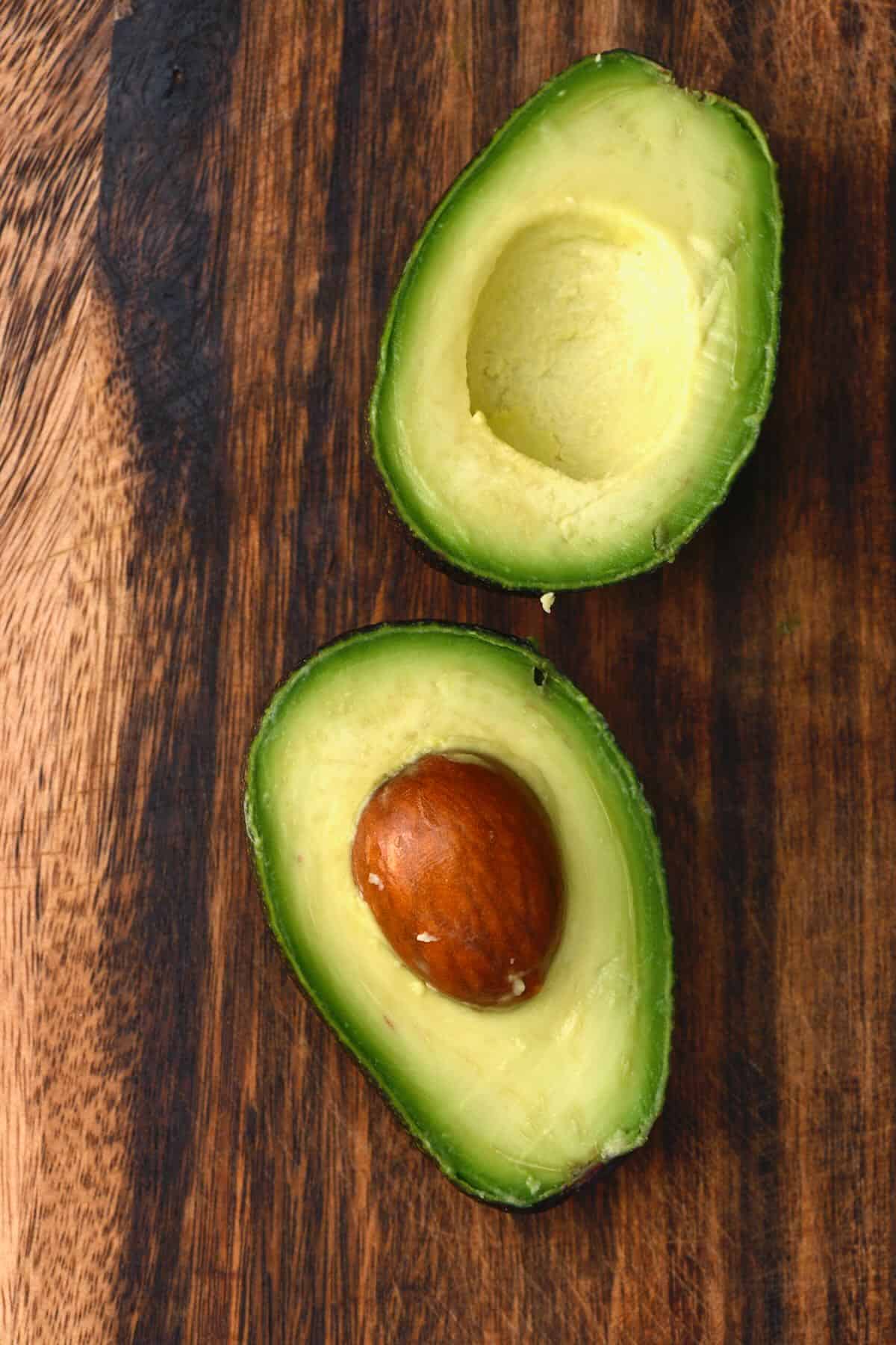 An avocado cut in two halves