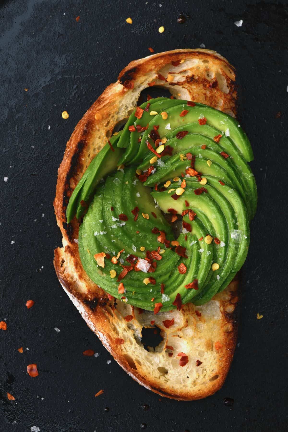 Avocado rosette over a slice of toasted bread