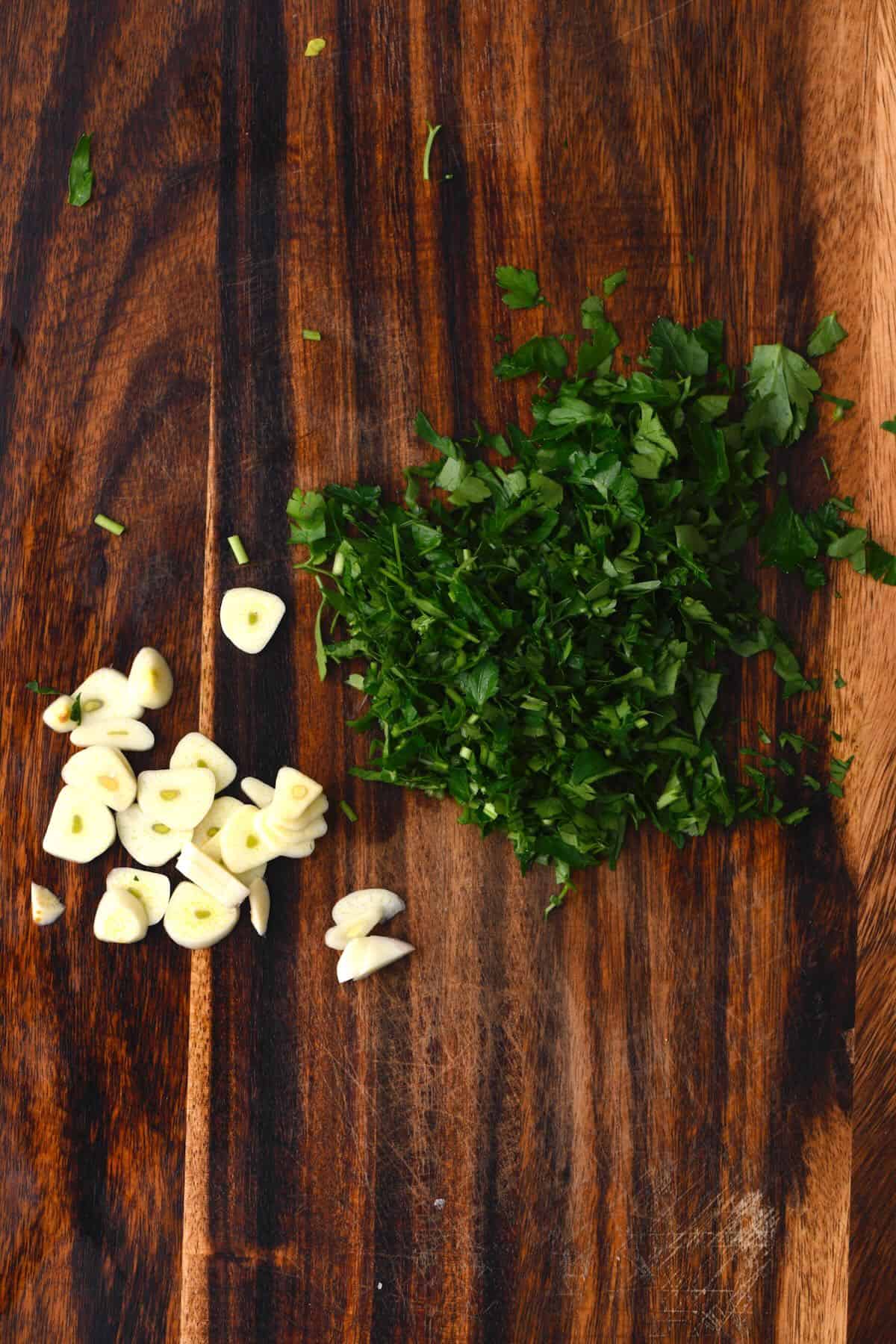 Sliced garlic and chopped parsley