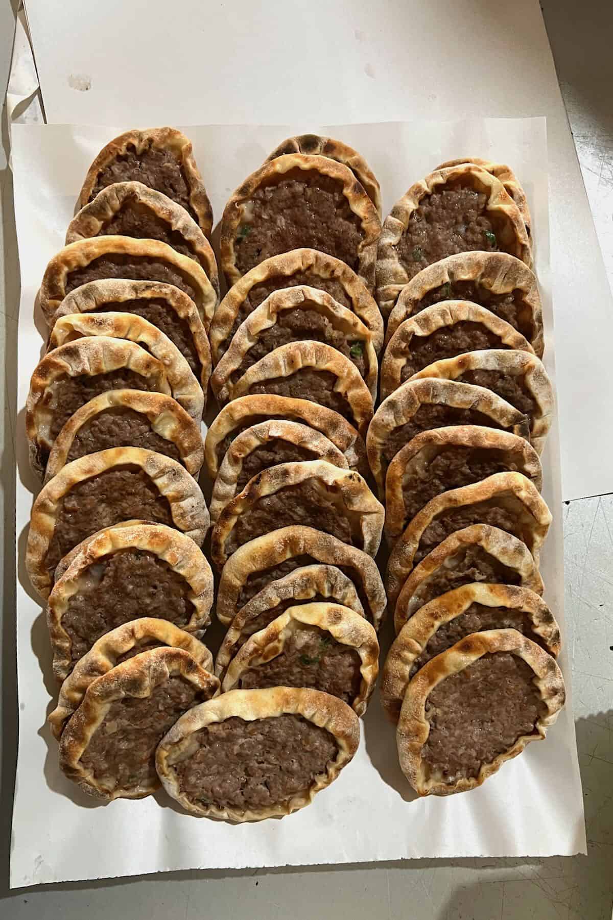 Three dozens of sfiha meat pies