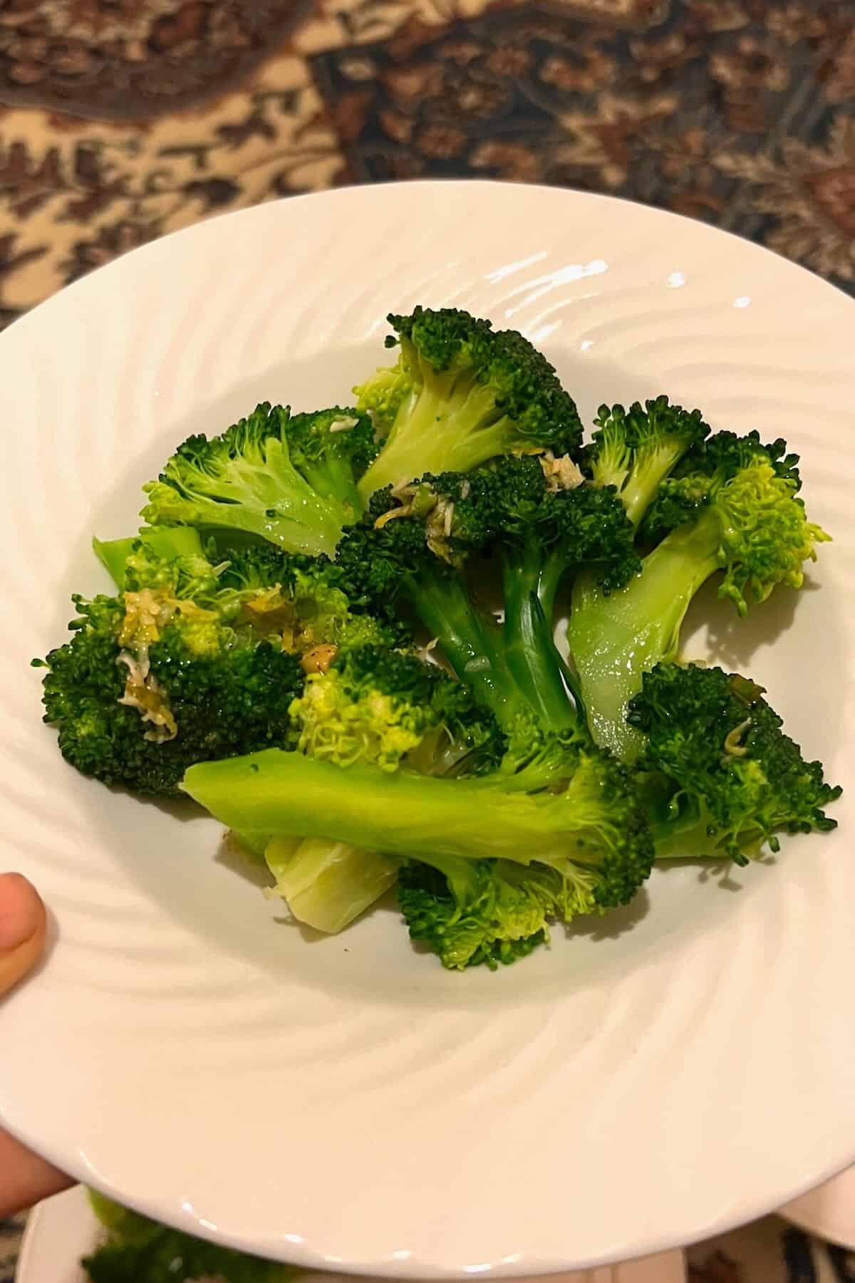 Broccoli topped with lemon butter sauce