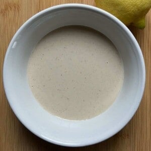 Lemon tahini sauce in a bowl