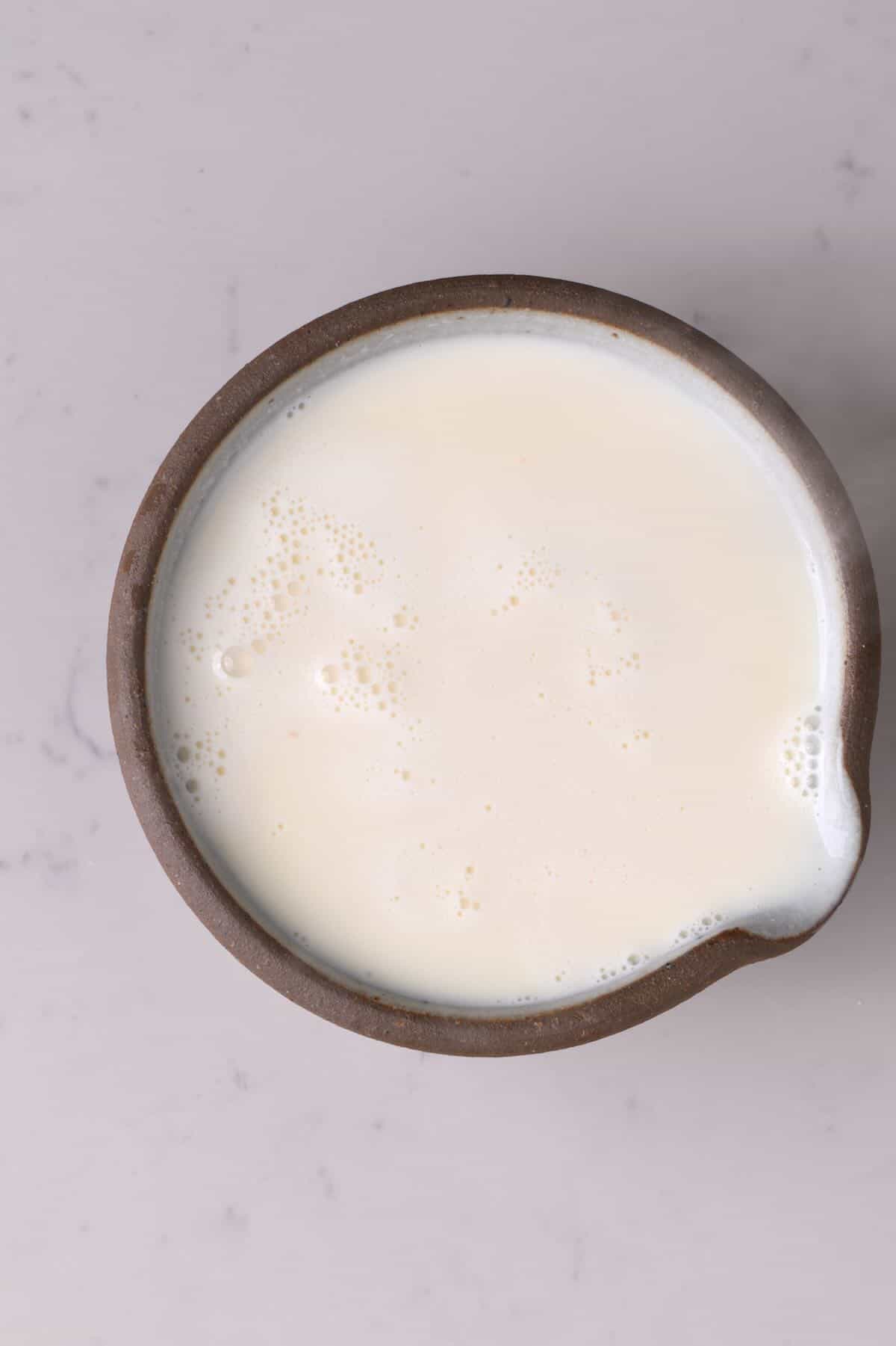 Milk and condensed milk mixture in a bowl