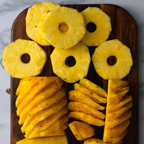 Pineapples cut into slices and rings