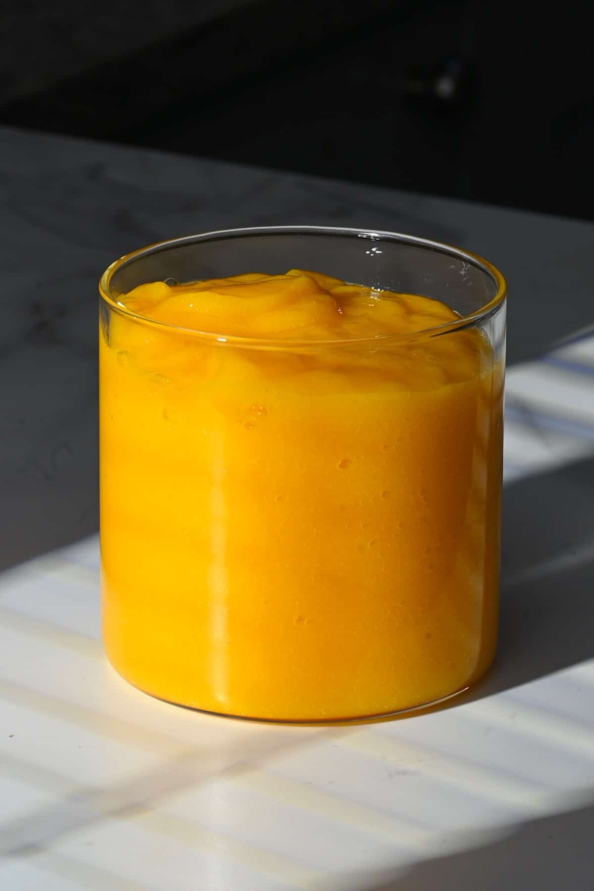 Mango juice in a glass