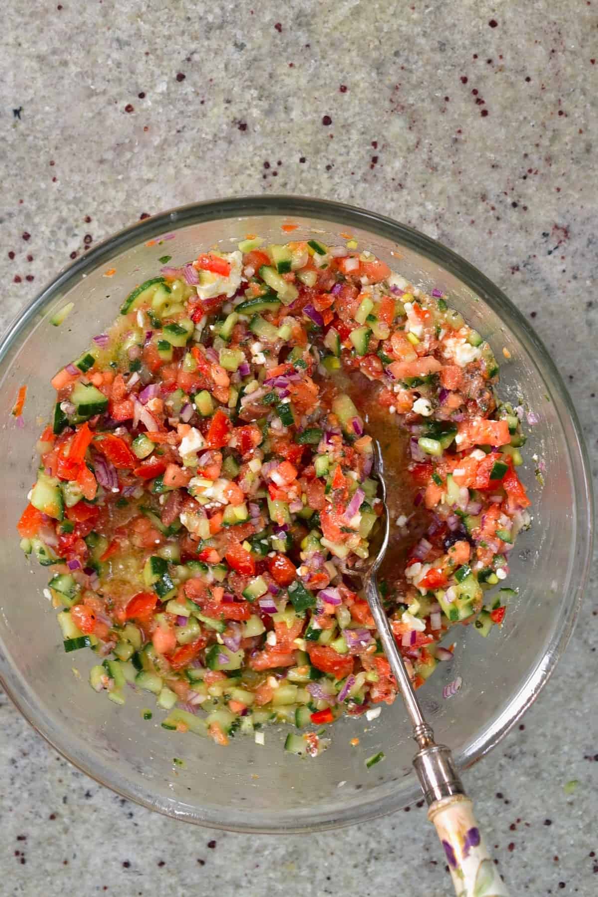 A bowl with mediterranean salad