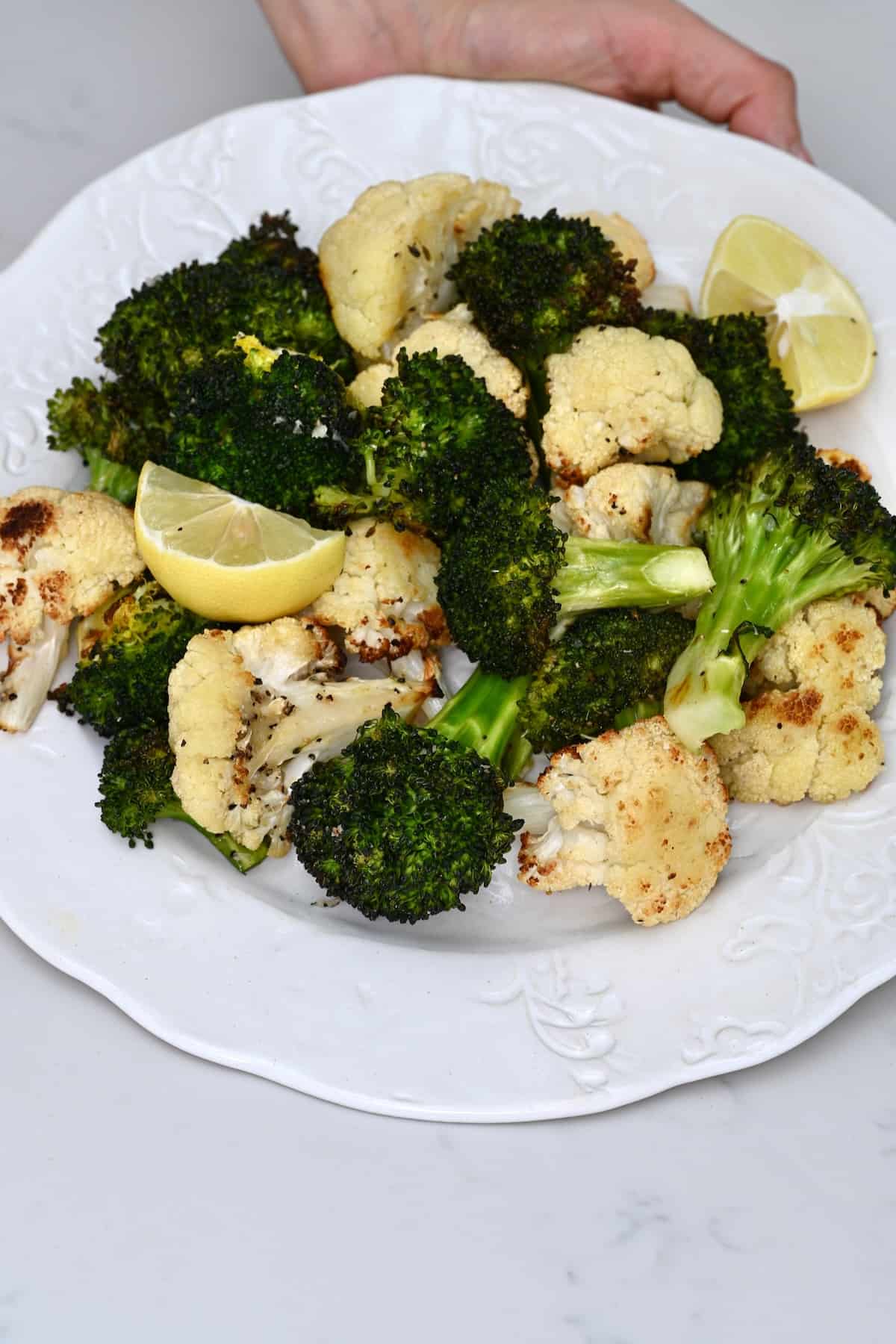 Roasted cauliflower and broccoli on a plate