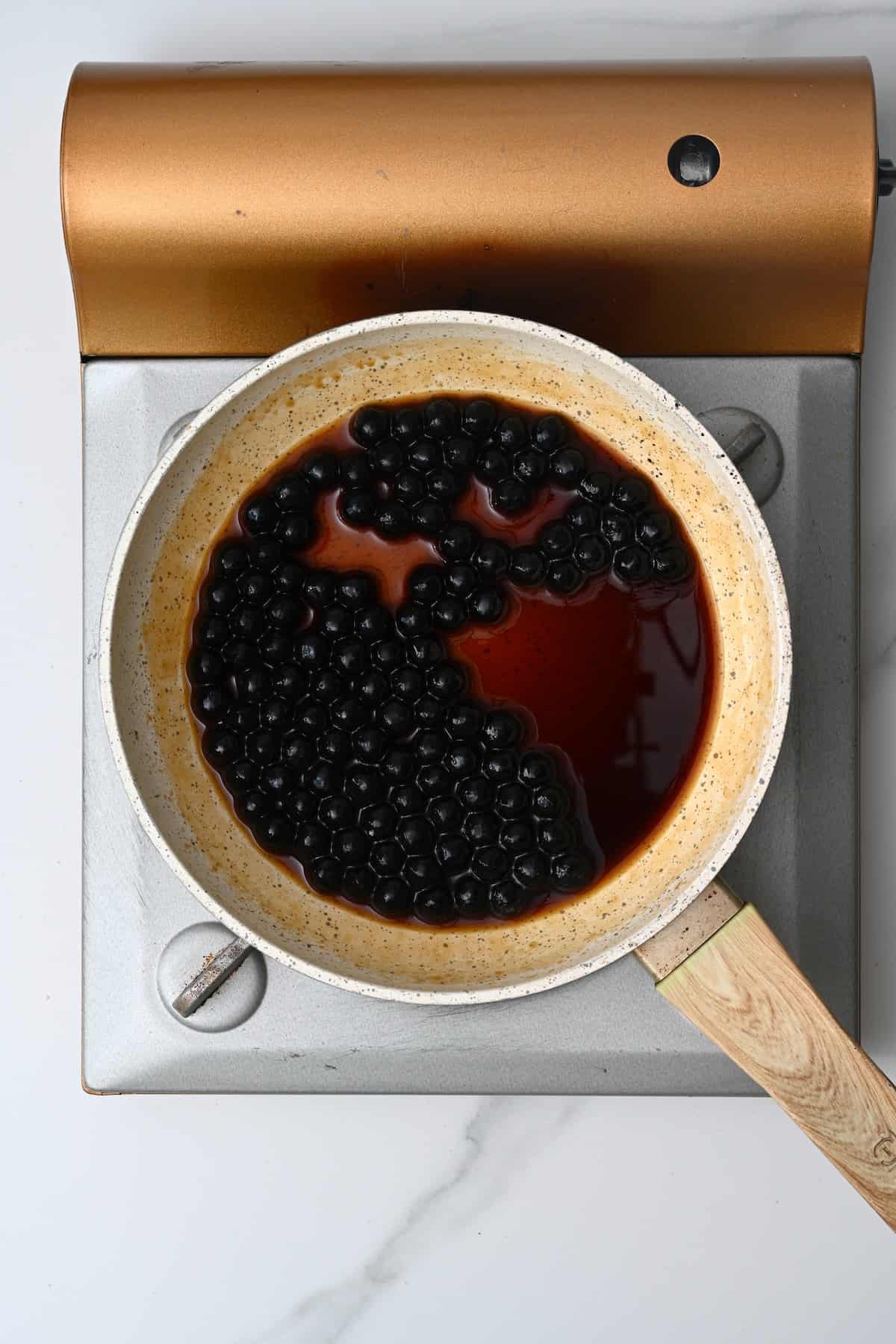 Tapioca pearls in sugar syrup on a pan