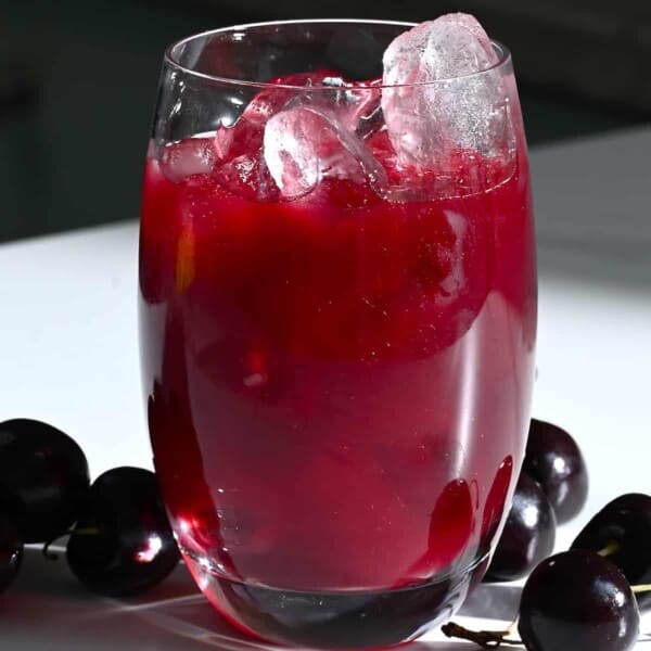 Cherry juice in a glass with ice