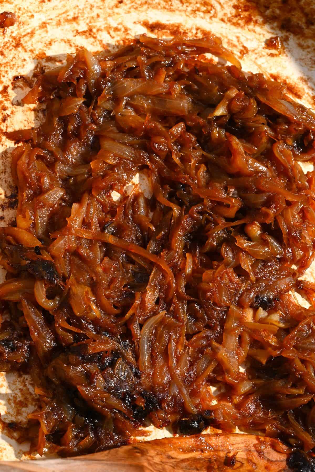 Close up of caramelized onions in a pan