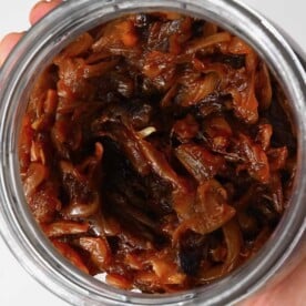 Top view of a jar filled with caramelized onions