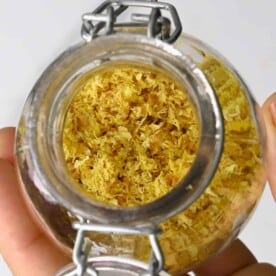 Dehydrated lemon zest in a small jar