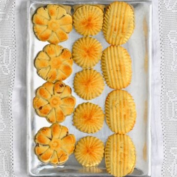 Maamoul cookies in different shapes on a tray