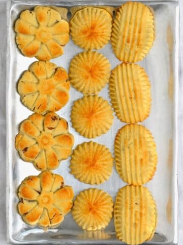 Maamoul cookies in different shapes on a tray