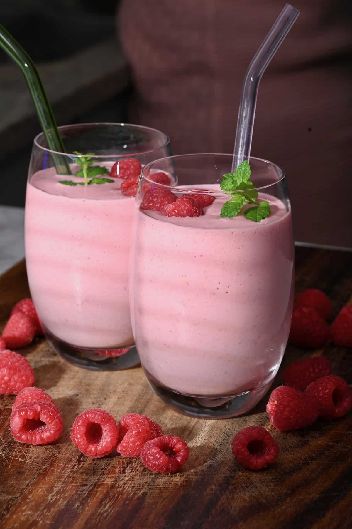 Two galsses with raspberry smoothie