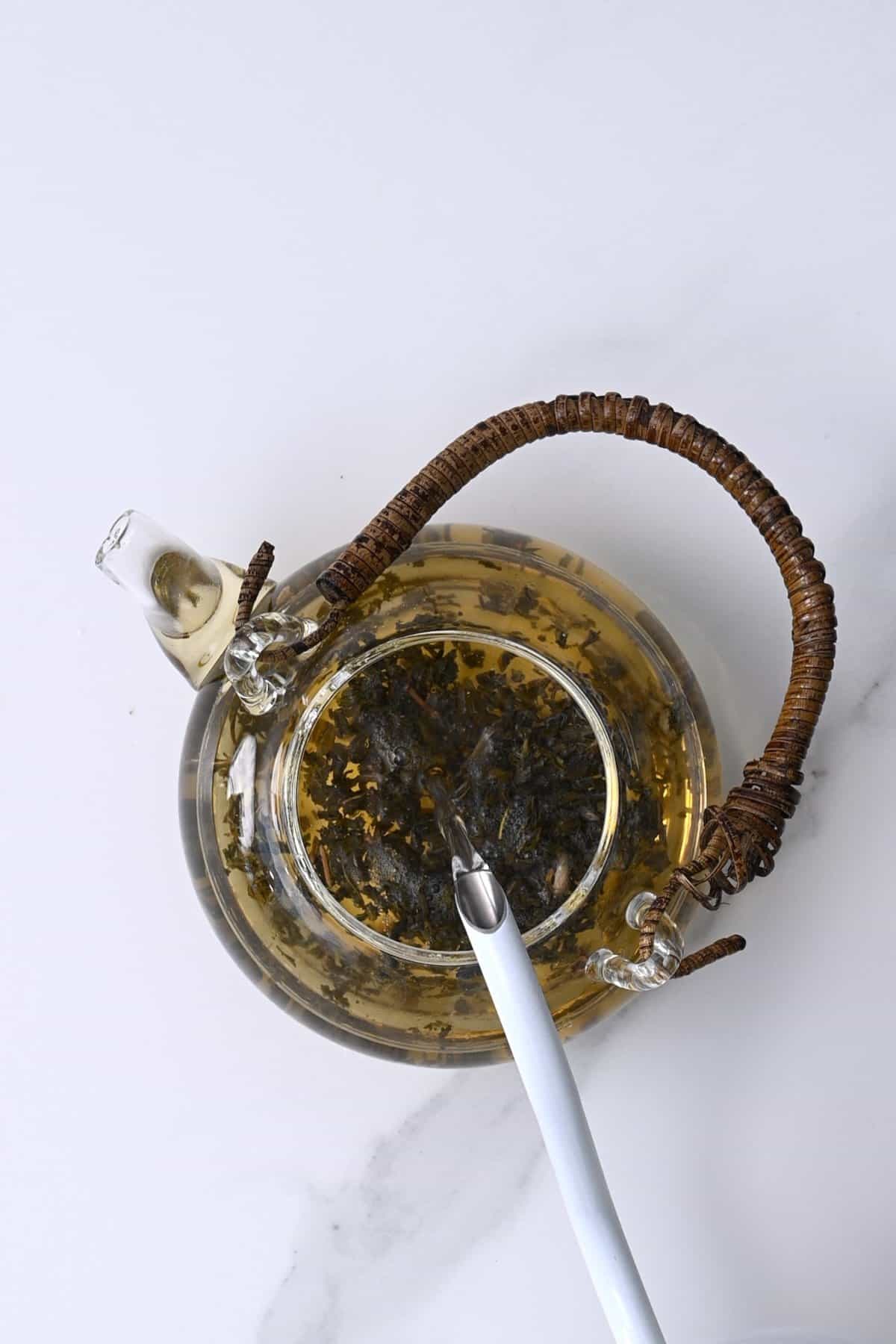 Steeping jasmine tea in a tea pot