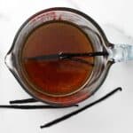 A large measuring cup with homemade vanilla syrup - 13