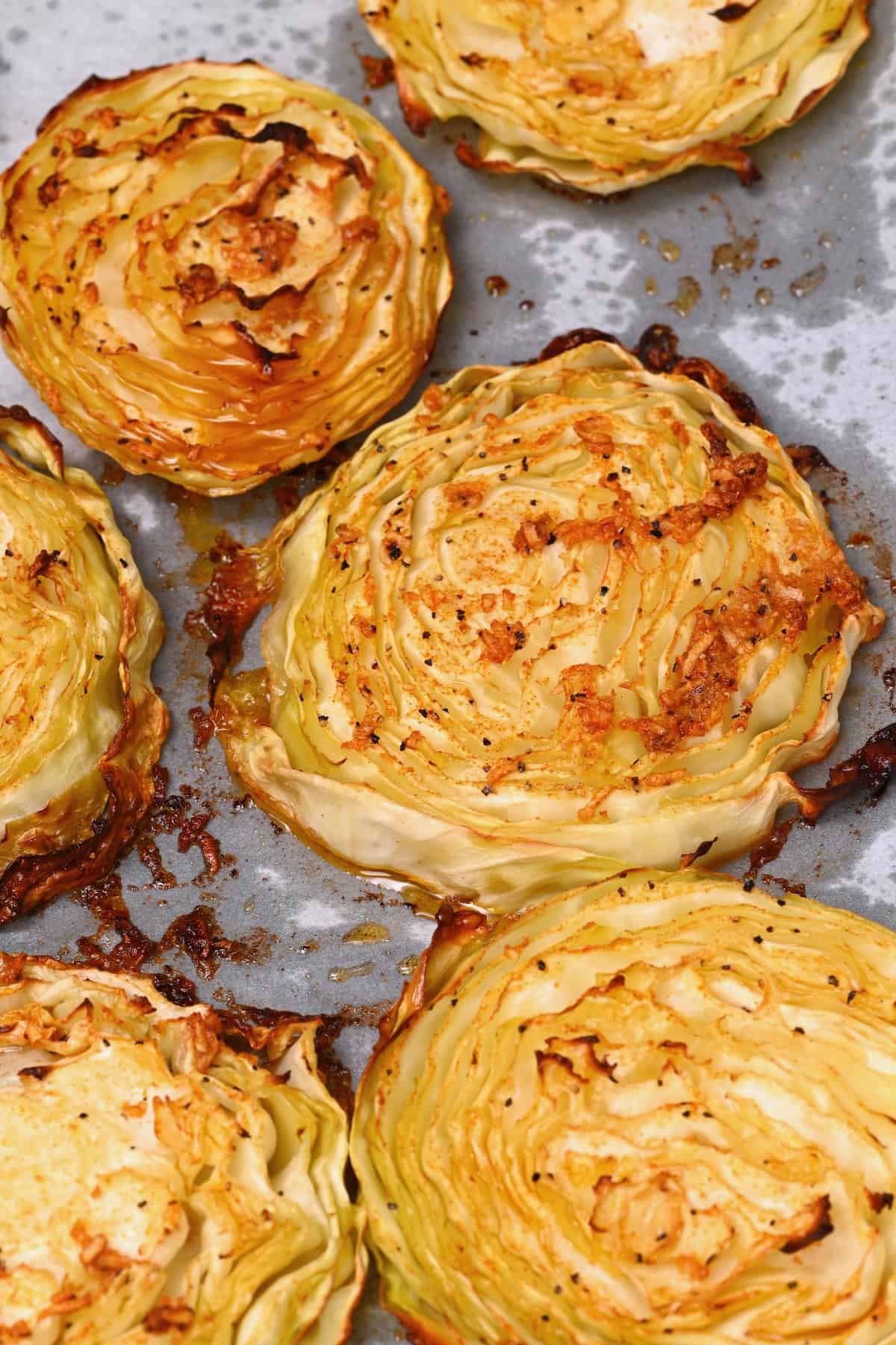 Oven-baked cabbage steaks