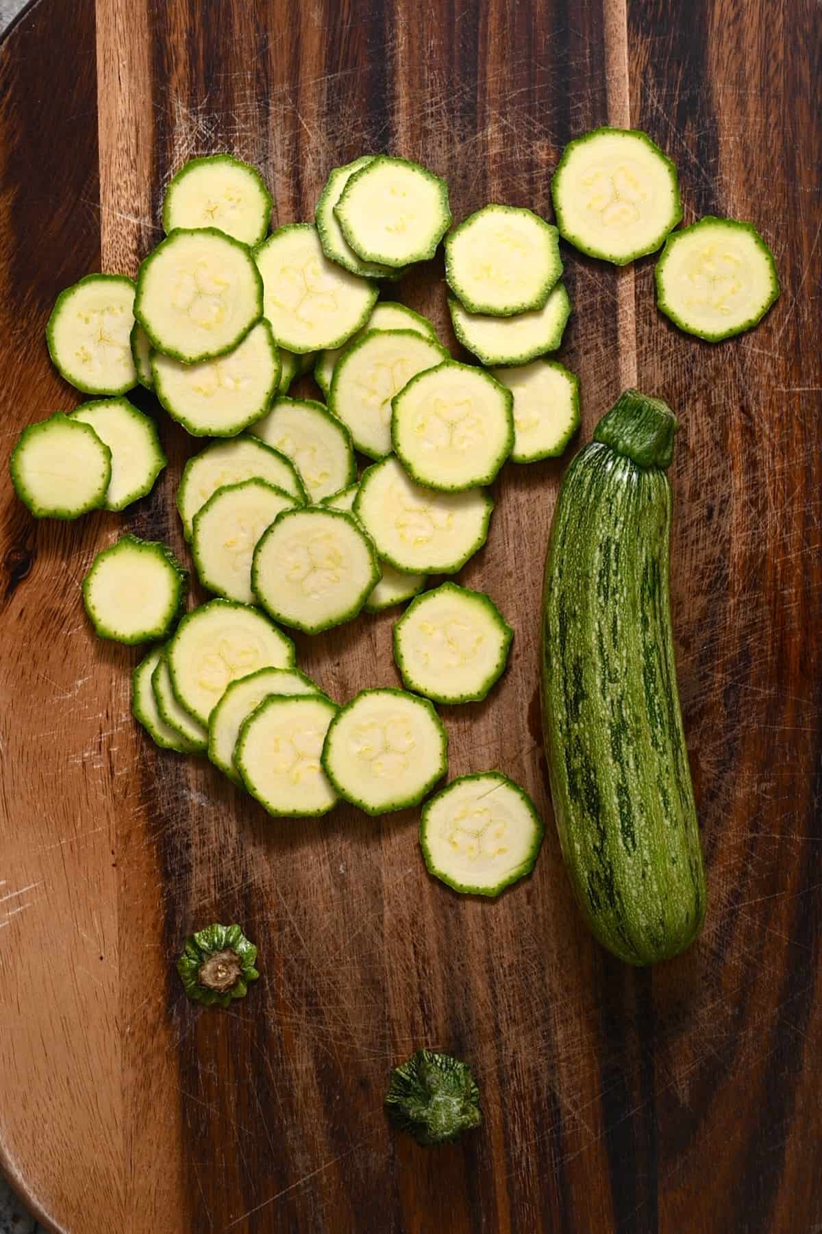 Sliced zucchini on a chopping board