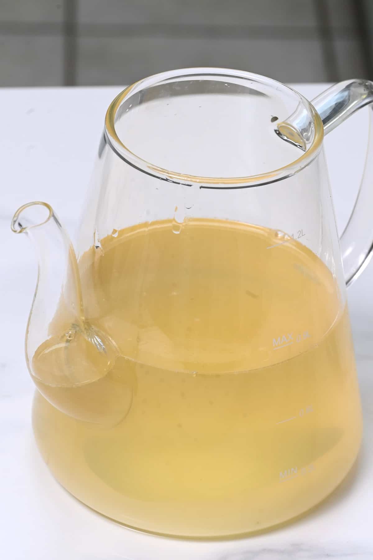Homemade ginger ale in a large pitcher