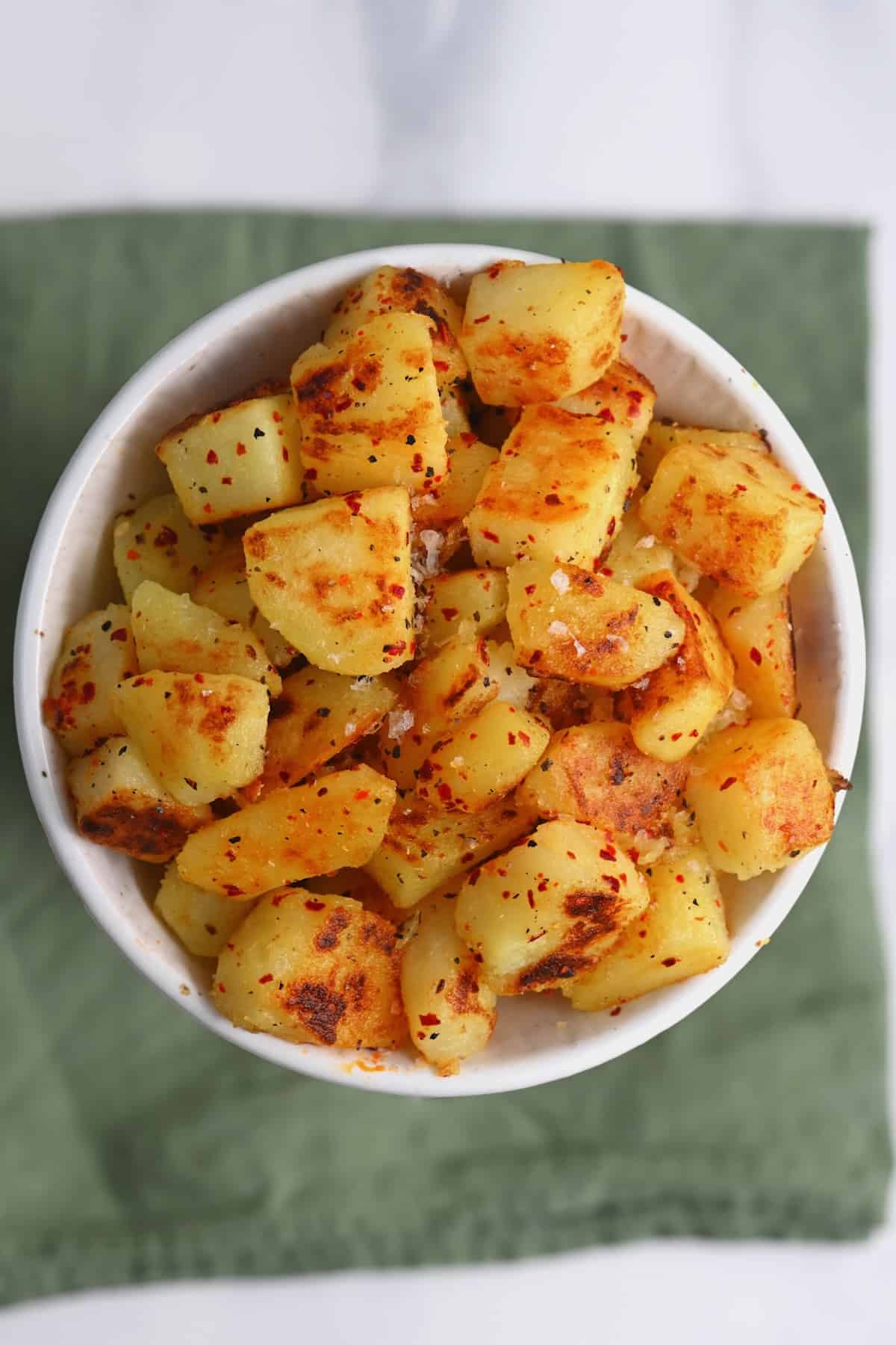 Pan fried potoatoes in a bowl