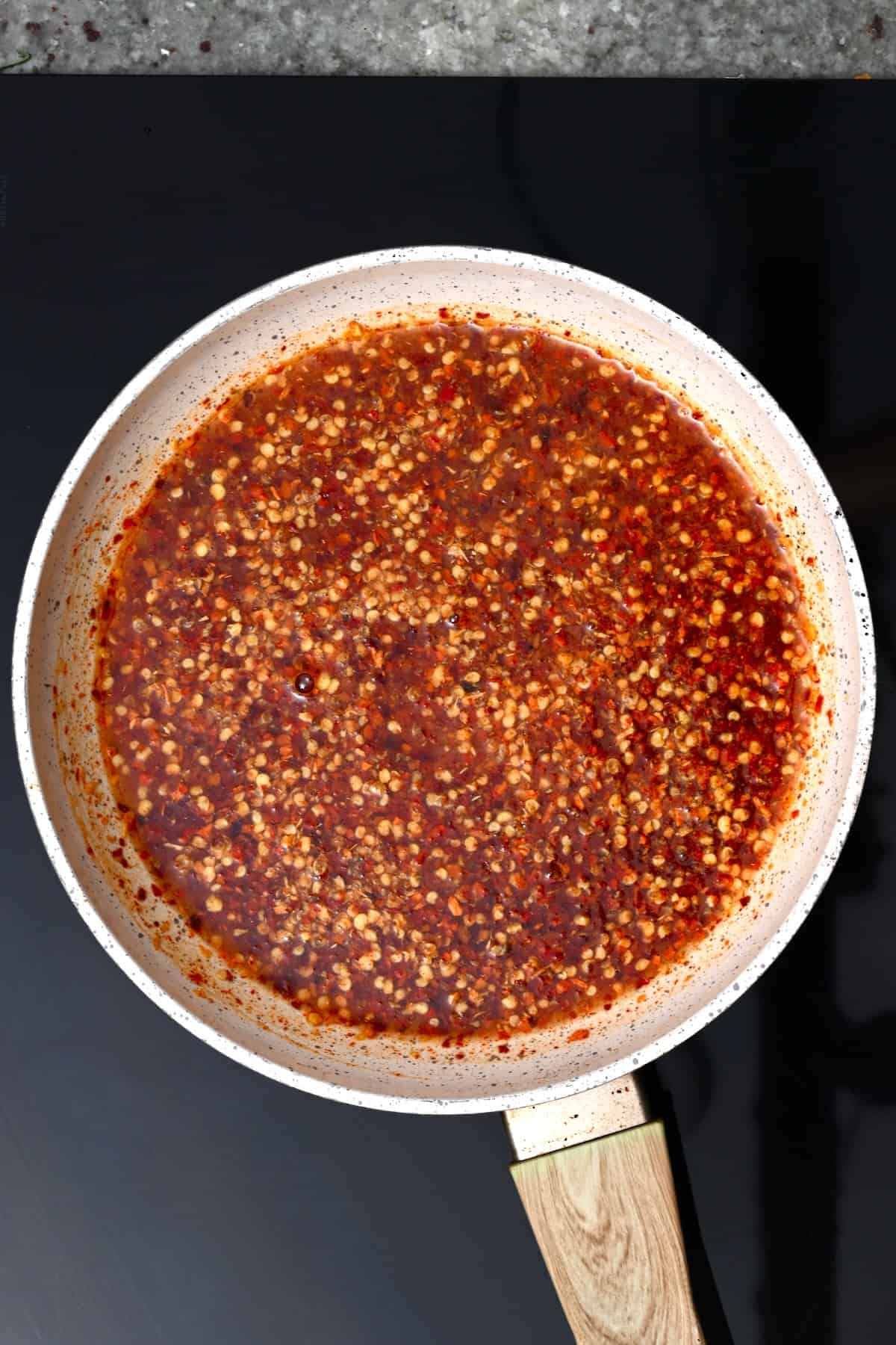 Homemade hot honey in a saucepan