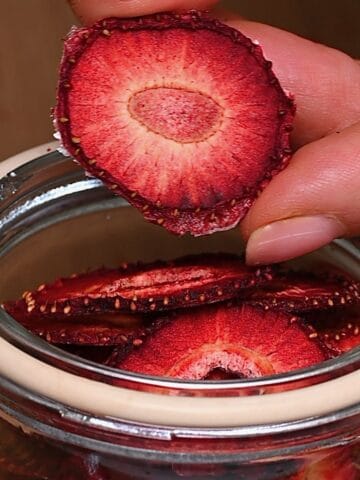 Homamde dehydrated strawberry chips in a jar