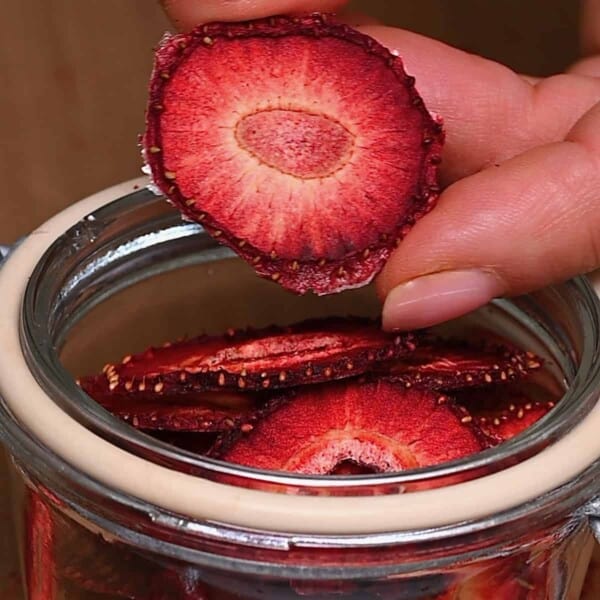 Homamde dehydrated strawberry chips in a jar