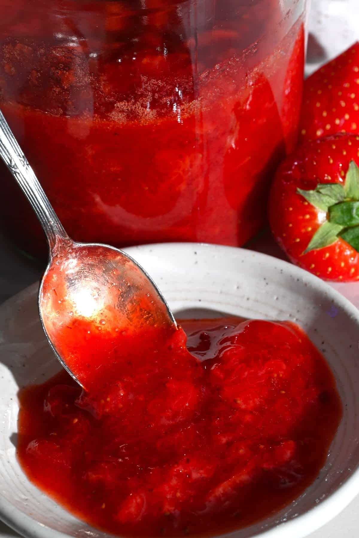 A spoonful of homemade strawberry compote