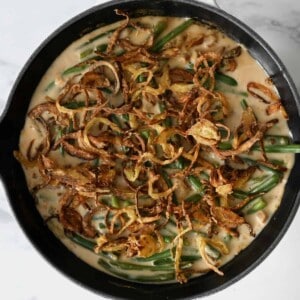 Green bean casserole topped with crispy onions