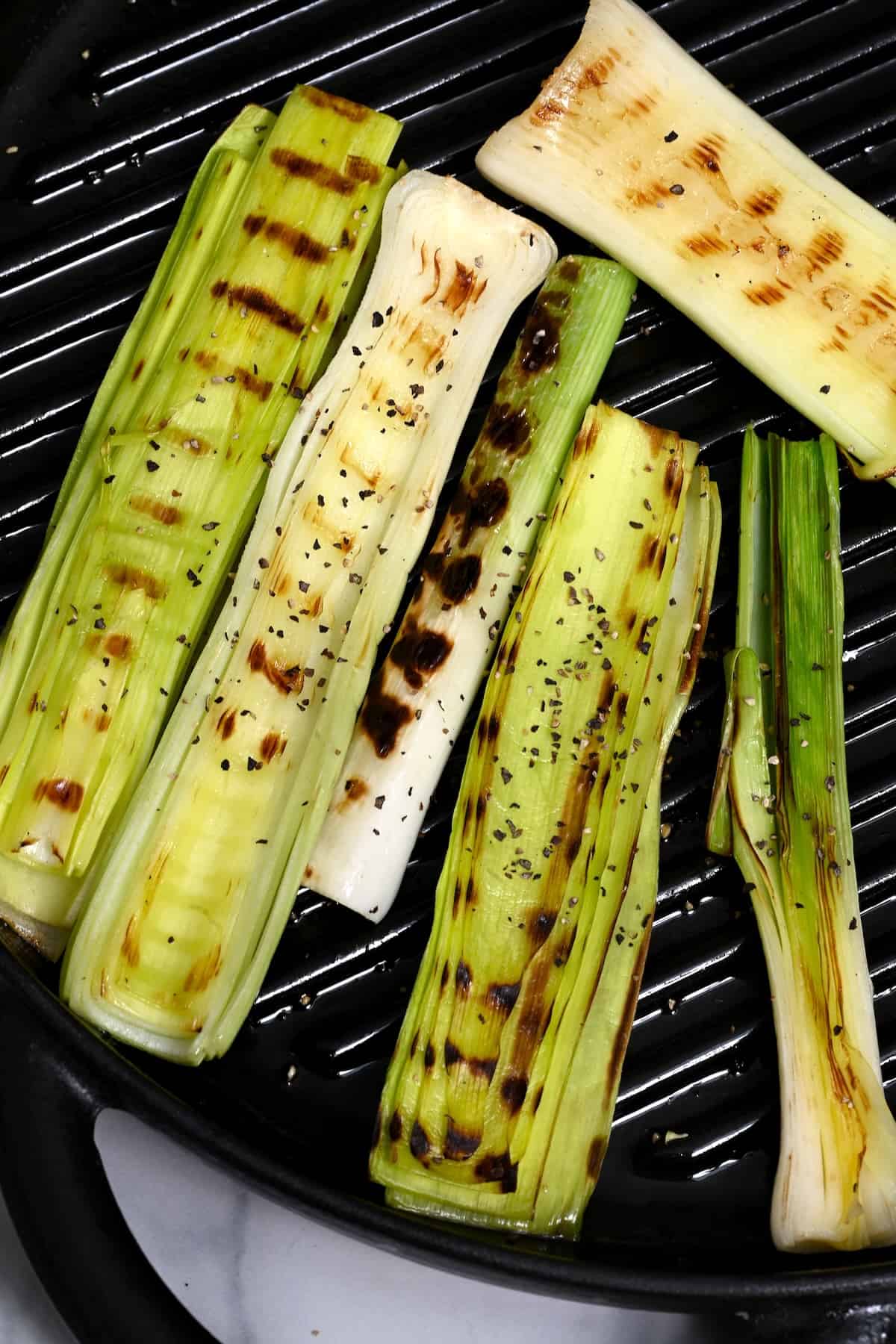 Leeks cooked on a griddle