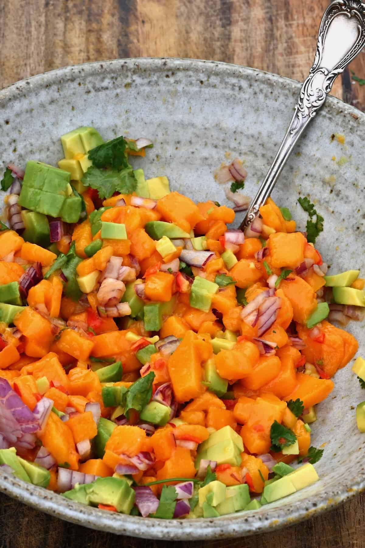 Mango salsa in a mixing bowl