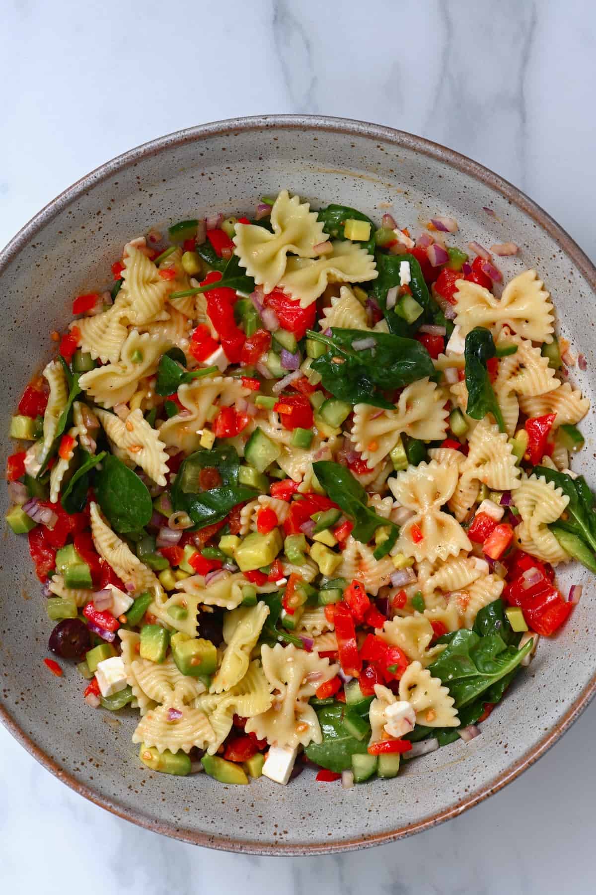 A serving of bowtie pasta salad