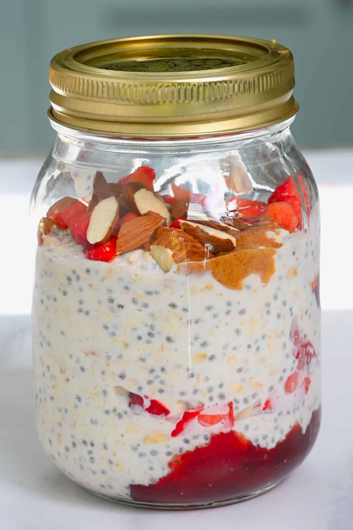 Strawberry shortcake overnight oats in a jar