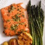Oven baked salmon fillet with asparagus and potatoes
