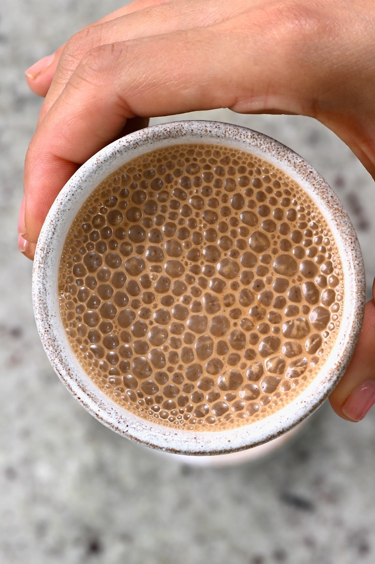 A cup with bulletproof coffee