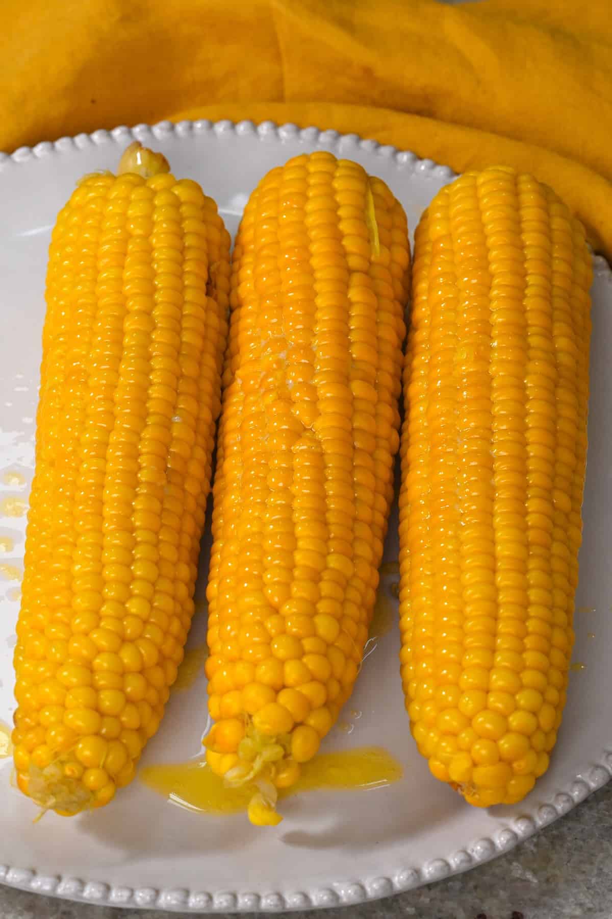 Boiled corn on the cob on a plate